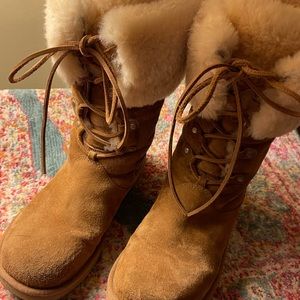UGG Metropolitan Collection boot. Chestnut suede uppers. Sheepskin lining.